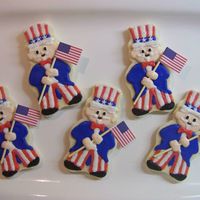 Uncle Sam Patriotic cookies I made for my daughter's daycare class. Inspired by Wilton.com cake design. I made the flags as well using cut down...