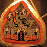 Haunted House I began making the monthly birthday cake at work and it happened to be October. I also did dracula cupcakes to go with it.
