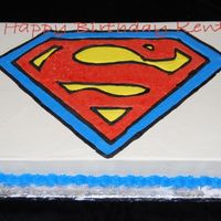 Superman 1/2 sheet cake. Simple Superman logo - iced and decorated in buttercream.