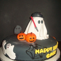 Halloween/b-Day Cake This was an off request I had for a halloween themed cake with a ghost holding a light saber and wearing a white sox hat! TFL