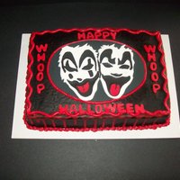 Insane Clown Posse Cake Faces made from fondant and the black was filled in with royal icing.