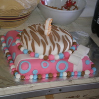 Blue, Pink And Brown Cake This is the cake I made for my daughter's 5th birthday. She designed it all, cake shapes, colors and pattern. I think she did an...