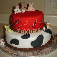 Birthday Cake Farm Theme Vanilla cake and butter cream filling, fondant and sugar fondant figurines. Everthing on the cake is edible.