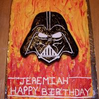 Darth Vader Butter cream flames, Vader is covered in black fondant, then i spreded black piping gel to get the shine, I think it came out pretty good,...