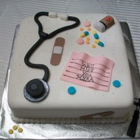 Nurse Retirement Vanilla cake with cookies and cream filling. All edible fondant decorations.