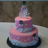 Snowman Birthday Inspired by one of the Wilton yearly magazines. This little girl wanted pink though. In the magazine it shows a pretty light blue. I think...