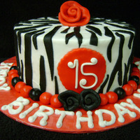 Zebra Cake Made for a friends daughter. Vanilla cake with Leah_S version of Charlottes whipped buttercream, fondant accents. Thanks for looking :)