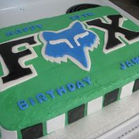 Fox Racing Cake I made this cake for a 20th Birthday. I attempted to do the logo in colouf flow but it broke when I put it on so I remade it in fondant. I...