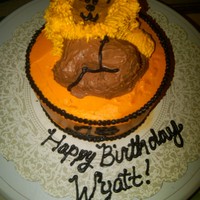 1St Birthday Lyon Cake a smash cake for the birthday boy...small lyon shaped pan ontop of a 6" round pan.