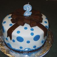 Brown And Blue Dot Cake This is my first cake using fondant. I made this cake for my 2 year old son's birthday. I used MM fondant.