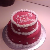 2 Tier Red Snowflake My first attempt at a tiered cake. Jumbo white snowflakes sprinkles on the sides.