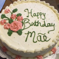 Mom's Cake Vanilla cake with whipcream frosting for my Mom's Birthday last year.