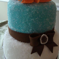 Aqua And Brown Engagement Cake I made this cake for my sister's engagement party. It looked great covered in fondant and sugar.