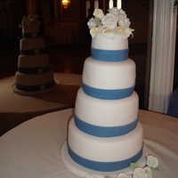 Blue And White Shower I made this as a gift to my friend for her bridal shower. The flowers were calla lillies and roses made of gum paste.
