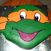 Ninja Turtle My very first attempt at using fondant. I covered my moist chocolate cake with a little buttcream then with the fondant. It was for my son...