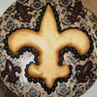 Fleur De Lis Chocolate cake with caramel bits. fondant with caramel added in. chocolate fleur de lis.