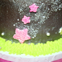 Shooting Stars Chocolate Cake with chocolate buttercream. Fondant decorations, sanding sugar, edible glitter stars. Original design by Denise.
