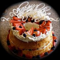 Angel Food Cake i got this idea from the cover on a magazine at safeway =) "happy fathers day" is handwritten in white chocolate