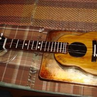 Guitar Cake! here's a cake i made for my friend! its a replica of his guitar (the closest i could do, anyways) and i wrote the signatures of the...