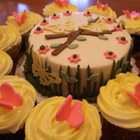 Butterfly Cake With Matching Cupcakes I made this cake to bring to my sister's house...the butterflies on the cake are done with the cricut and so is the branch. This was a...
