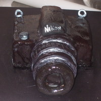 Nikon Cake I was actually very happy with this cake. It was the first real "3D" cake I made.....it was for my son's girlfriend and she...