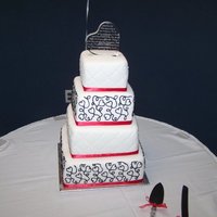Heart Themed Wedding Cake My parents and I just made this cake for my sisters wedding. It is a 4 tier square wedding cake. The bottom is a 12 inch white cake with...