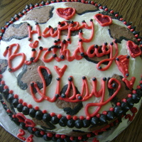 Cheetah Spot Cake this cake was actually very simple , its just buttercreme icing that i let crust really well then iced my spots once they crusted i smooth...