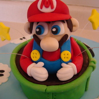 Super Mario sponge caked, butter icing and jam, covered in fondant.