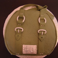 Handbag Cake handbag cake for my sisters 40th. White cake with butter icing and jam filling. Covered in fondant.