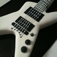 Dean Ml Guitar For a 12 year old's birthday! He was very pleased - the guitar was almost life-size. I tried to make the strings out of royal icing...