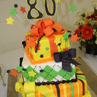 3 Tier 80Th Birthday Square Present Cake 3 tier square cake 6" lemon stand, 8" key lime, 10" orange creamsicle. Iced in decorators buttercream along with fondant/...