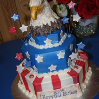 Patriotic 80Th Birthday Cake With 3D Eagles Head 3 tier hexagon cake with decorators buttercream and fondant details. Bottom tier was butter pecan flavored cake and the rest was almond...