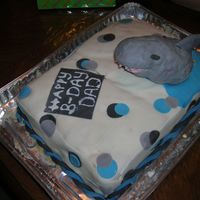 Shark Cake For My Dad's 62Nd Birthday This is my sisters and I first time using the fondant. The shark is made of rice krispies.