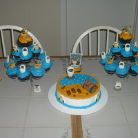 Walle Extravaganza 8 inch round with Walle toys from the disney store. 26 cupcakes with walle icing decorations and party toppers. Thanks for looking