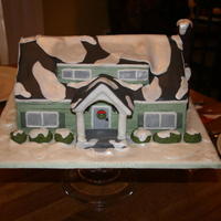 Grandmas House Green buttercream cake with fondant details.