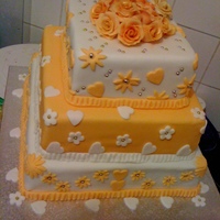 O & W orange & white square cake with dragees