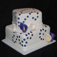 Stars & Calla Lilies A bit of an odd mixture (stars and lilies) but the bride loved it. :) Chocolate cake with caramel coffee mousse filling.