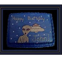 Alien And Ufo 1/4 sheet white cake with buttercream icing, I placed the images on the cake using piping gel.