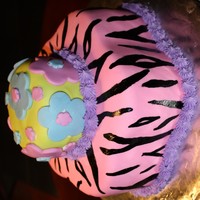 Hot Pink Zebra Cake This is a almond cake with raspberry creme filling and almond BC and mmf.