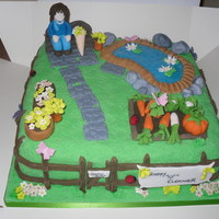 Eleanor's Garden garden themed cake with pond
