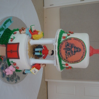 St. Aidan's Cake For Director I made this retirement cake for the director of my daughter's pre-school. I made the people out of fondant. The tire swing is made out...