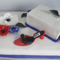My First Shoebox/shoe Cake - Gluten-Free! My first attempt at a shoebox, gumpaste shoe, and gumpaste anemones. It was for a bridal shower. Yellow gluten-free cake filled with...