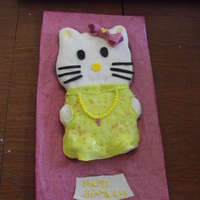 Hello Kitty Birthday Cake My Grandbabies first birthday. The cake is dark chocolate, peanut butter filling, peanut butter bc and fondant.