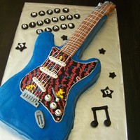 Blake's Electric Guitar Cake Electric Guitar Cake made to look just like the 13 yr old musician's real guitar!! Was sent photos and after seeing the real deal, was...