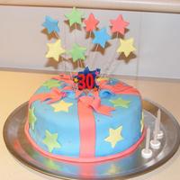 30Th Birthday Cake chocolate cake with milk chocolate ganache. Fondant decorations.