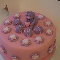 My Daughters Christening Cake This is my third fondant iced cake and is for my daughters christening. The cake is a nice brandy soaked fruit cake and it has been covered...
