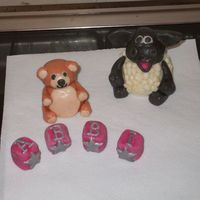 Bear And Sheep Models These are 2 models I have made to go on top of cakes. One is a teddy with Baby building blocks. The other is a character called Timmy Time...