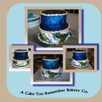 Naturescape This cake is designed with fondant. the flowers, vines and leaves are hand sculpted with fondant. The tall grass is rice paper. And it'...