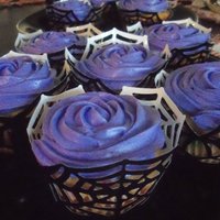 Halloween Spiderweb Rose Cupcakes i made these for our halloween party. just funfetti with buttercream.