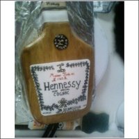 Hennessy Cake carved a 9x13 sheet cake, used fondant and gel colors mixed w/ vodka for my paint